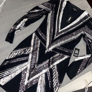 Express size small cocktail dress. Tags on never worn. Silver and black sequins.
